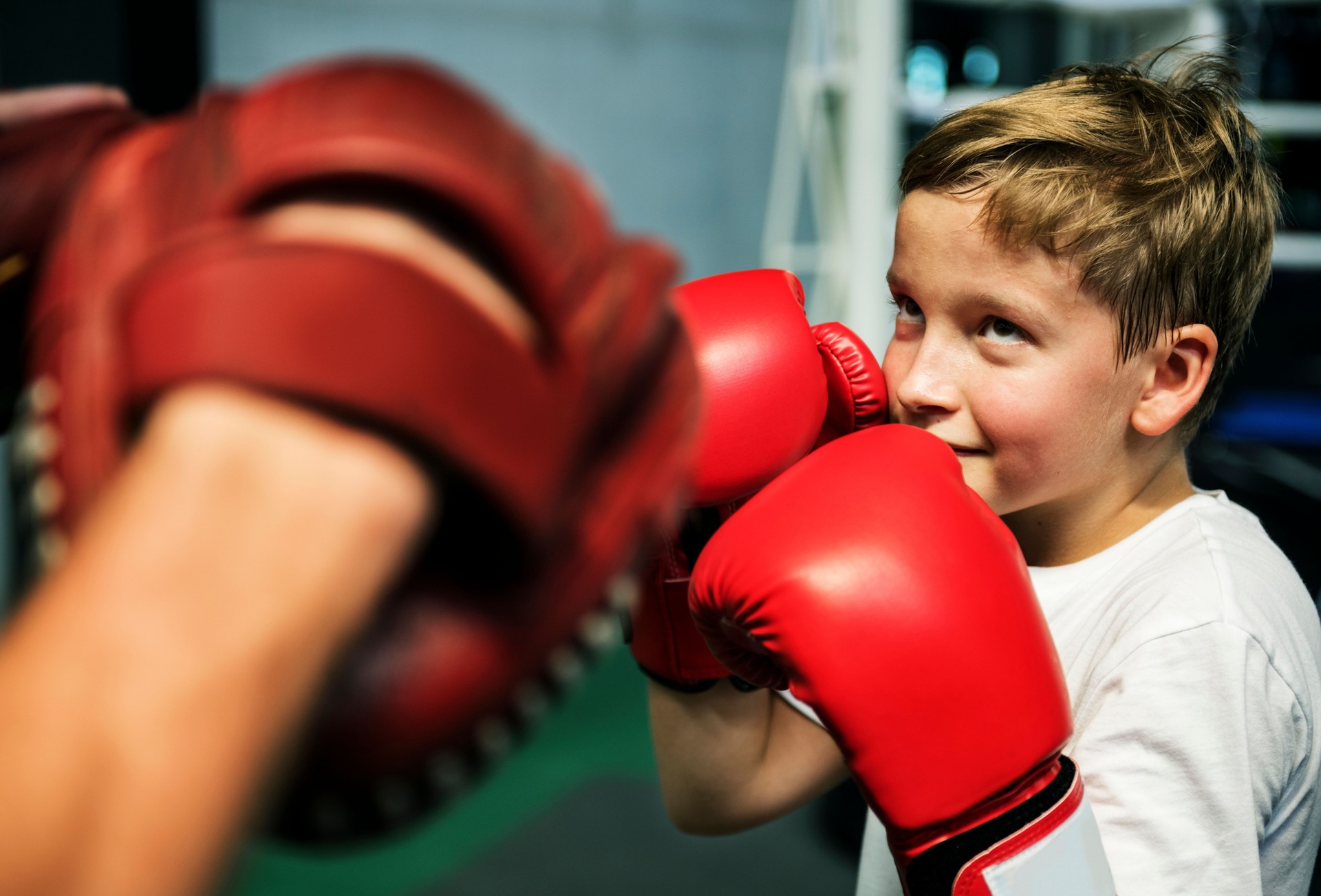 Boy Boxing Training Punch Mitts Exercise Concept